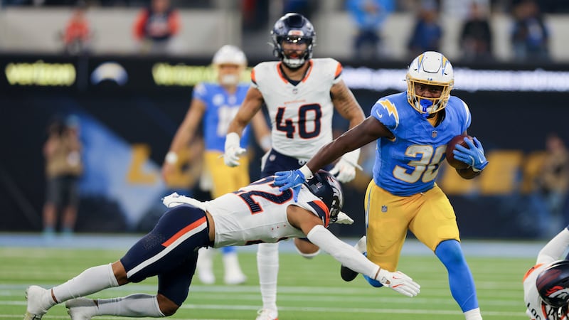 Chargers score on free kick and rally past Broncos 34-27